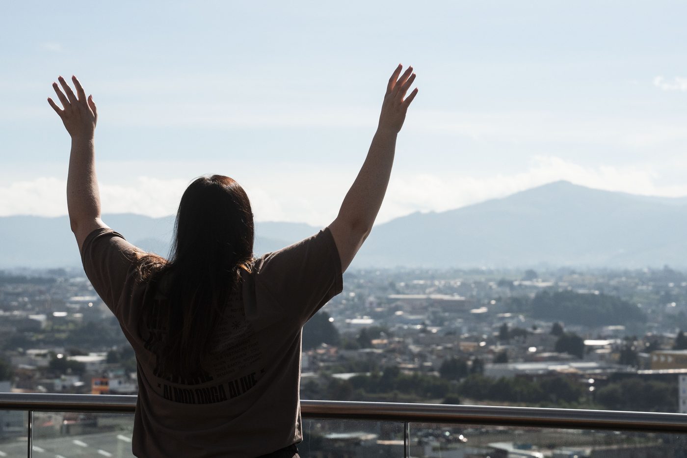 Hands raised at a missions gathering